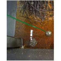 CNC skæreudstyr til genvinding af væske, der bruges i en sværdetæppe.