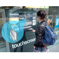 A custom size touch screen overlay in use in a window.
