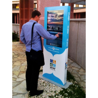 A man using an outdoor display from the leading touch screen manufacturers