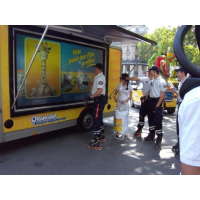 An outdoor touch screen promotional van