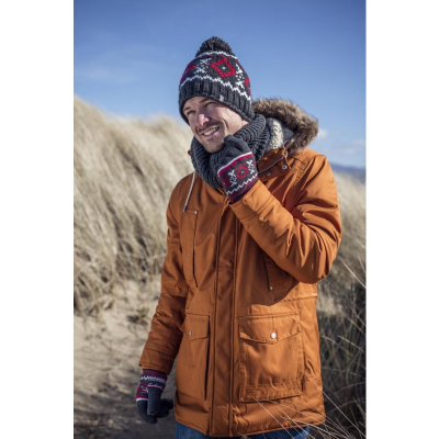 A man wearing hat and gloves from the leading thermal clothes manufacturer.