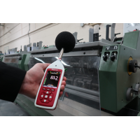 Nosie level meter being used to measure industrial noise.