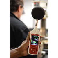 workplace noise monitoring equipment in a factory