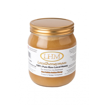 Jar of pure raw golden honey