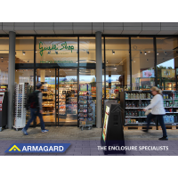 Digital signs on castors outside a supermarket.