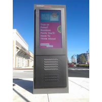 Anti-glare totem digital signage in-situ on a street