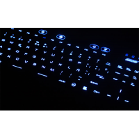 Waterproof keyboard with touchpad close up showing blue backlit keys
