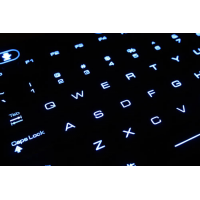 illuminated keyboard close up with keys lit up