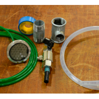 Kit di installazione per il sistema di recupero del fluido da taglio.
