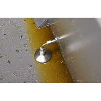 Vakuum kopphode på et oljesparesett.