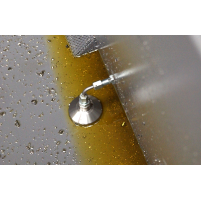 Maskinverktygets kylvätskeåtervinningskit som används i en spån.